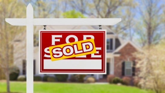 for sale sign with sold sticker