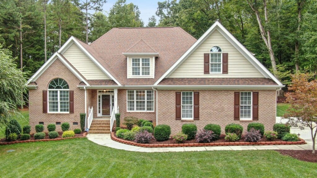 Brick House with Grass Lawn